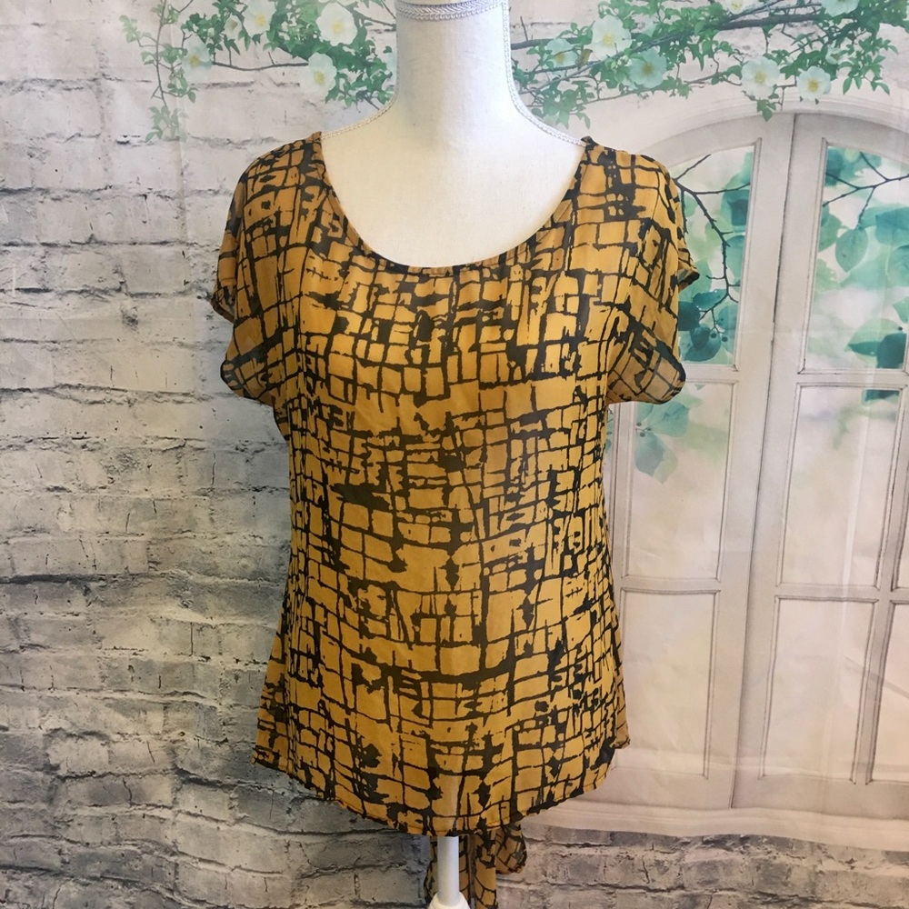 Fun and flirty Mustard/black color blouse